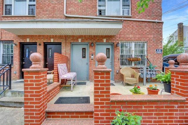 1934 Chatterton Ave, Bronx, NY 10472 - doorway to property with brick siding and covered porch