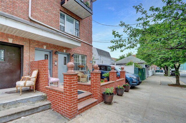 1934 Chatterton Ave, Bronx, NY 10472 - entrance to property with brick siding and fence