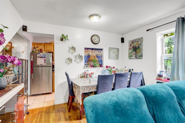 1934 Chatterton Ave, Bronx, NY 10472 - dining room with light wood-style floors and baseboards