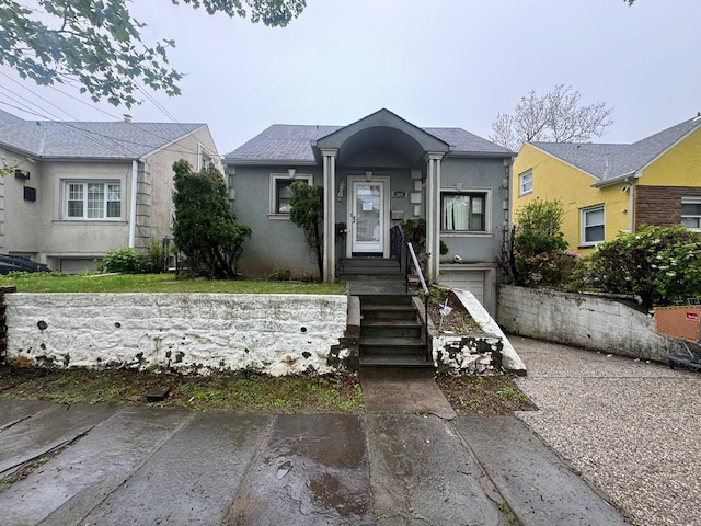 548 S 10th Ave, Mount Vernon, NY 10550 - view of front of property with an attached garage and stucco siding