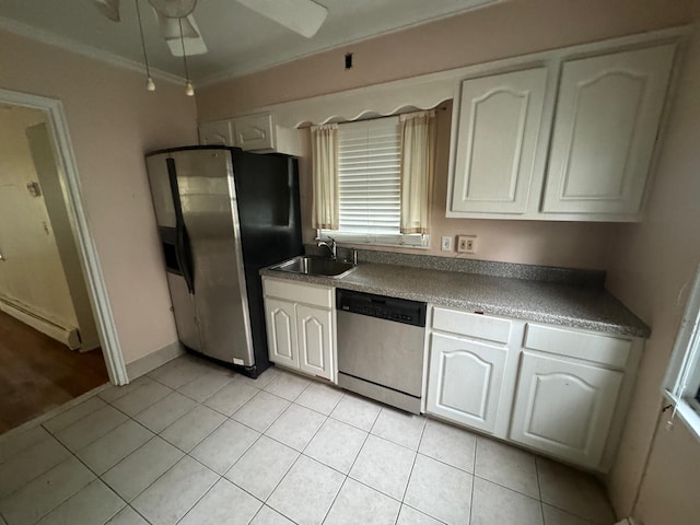 548 S 10th Ave, Mount Vernon, NY 10550 - kitchen featuring a sink, stainless steel appliances, ceiling fan, light tile patterned floors, and white cabinets
