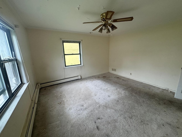 548 S 10th Ave, Mount Vernon, NY 10550 - carpeted spare room featuring a baseboard heating unit, ornamental molding, visible vents, and a ceiling fan