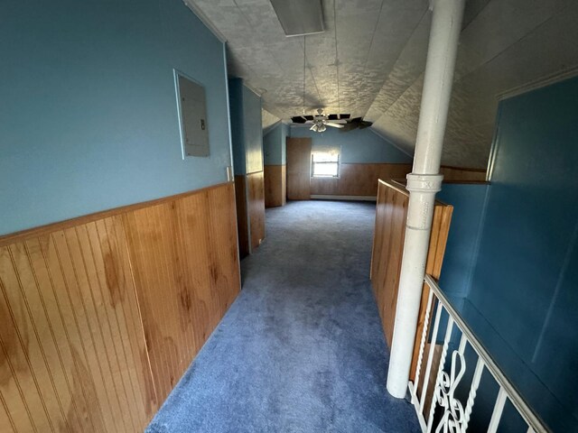 548 S 10th Ave, Mount Vernon, NY 10550 - additional living space featuring carpet flooring, a ceiling fan, electric panel, wainscoting, and lofted ceiling
