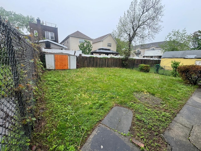 548 S 10th Ave, Mount Vernon, NY 10550 - view of yard with a storage shed, an outdoor structure, and a fenced backyard
