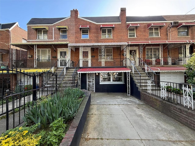 3106 Eastchester Rd, Bronx, NY 10469 - view of property featuring brick siding and fence private yard