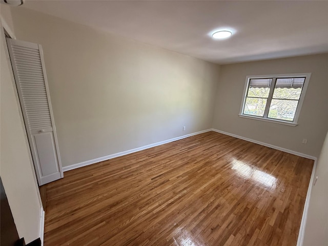 3106 Eastchester Rd, Bronx, NY 10469 - empty room featuring baseboards and wood finished floors