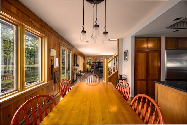 11 Louie Way, Woodstock, NY 12498 - dining room featuring healthy amount of natural light and wooden walls