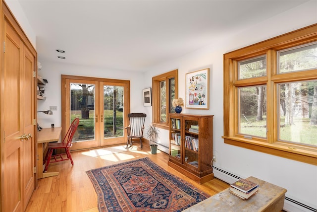 11 Louie Way, Woodstock, NY 12498 - living area featuring french doors, a baseboard radiator, light wood-type flooring, and recessed lighting