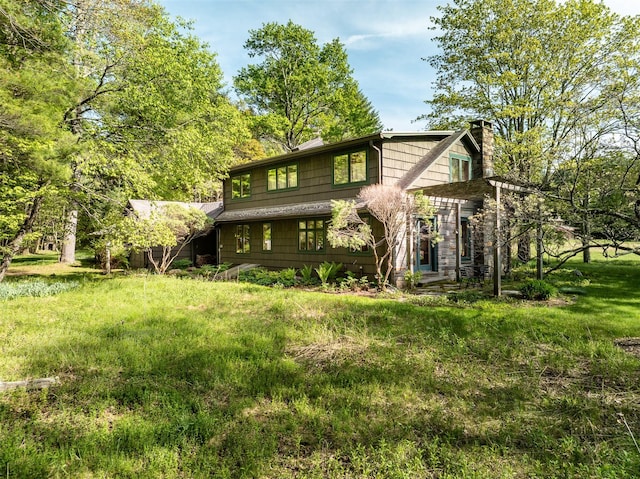 11 Louie Way, Woodstock, NY 12498 - back of property with a chimney