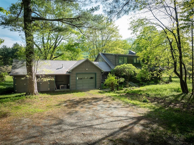 11 Louie Way, Woodstock, NY 12498 - garage with asphalt driveway