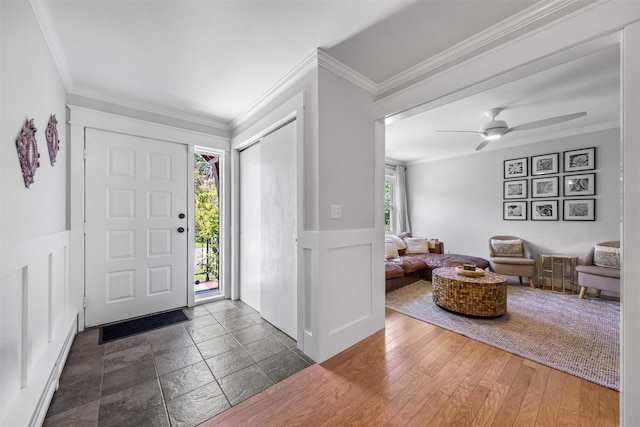 32 Lafayette Ave, Beacon, NY 12508 - foyer with wainscoting, ornamental molding, a decorative wall, and ceiling fan