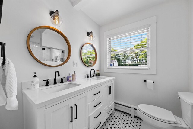 32 Lafayette Ave, Beacon, NY 12508 - bathroom featuring double vanity, baseboard heating, and a shower