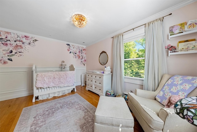 32 Lafayette Ave, Beacon, NY 12508 - bedroom featuring crown molding, wood finished floors, and wainscoting