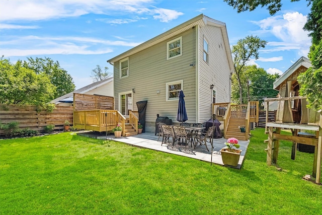 32 Lafayette Ave, Beacon, NY 12508 - back of property featuring a patio area, a wooden deck, and stairs