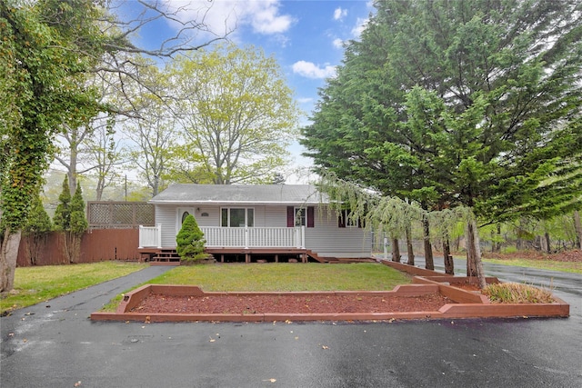 view of front of house featuring a deck