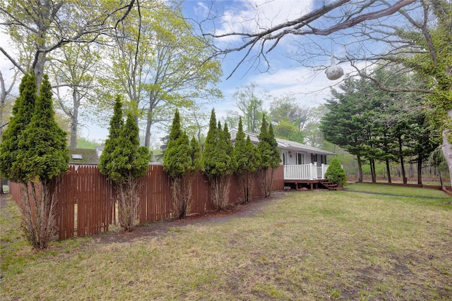 view of yard featuring a deck