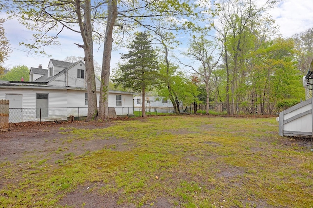 view of yard featuring fence