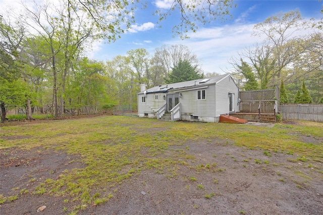 fenced backyard with entry steps