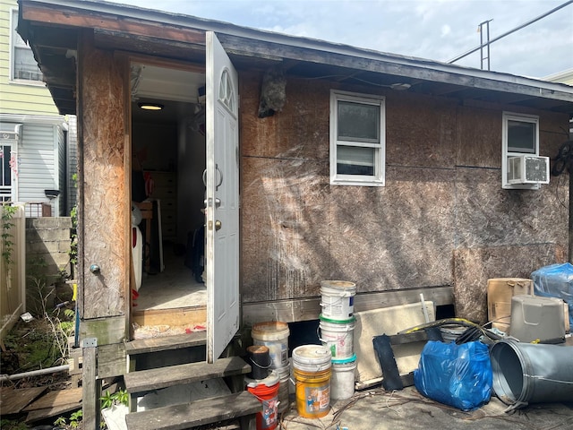 view of side of property with cooling unit