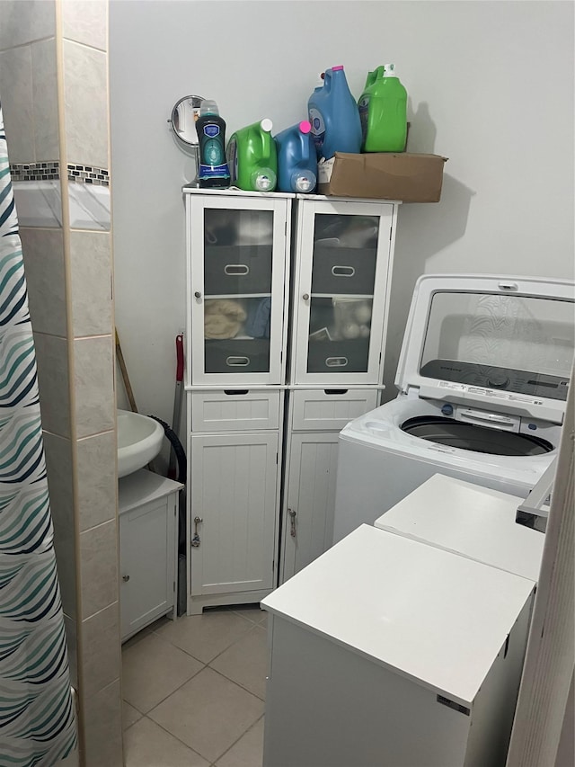 555 Hemlock St, Brooklyn, NY 11208 - laundry room with light tile patterned floors