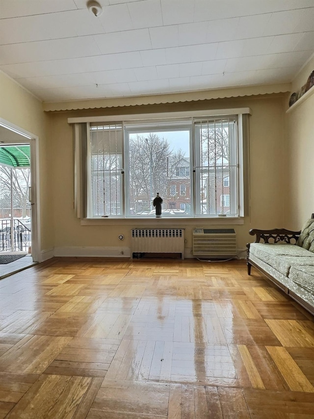 unfurnished living room with radiator