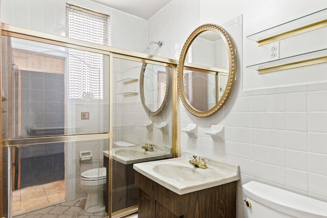 20-58 35th St, Astoria, NY 11105 - bathroom featuring tile walls, toilet, vanity, and a shower with door