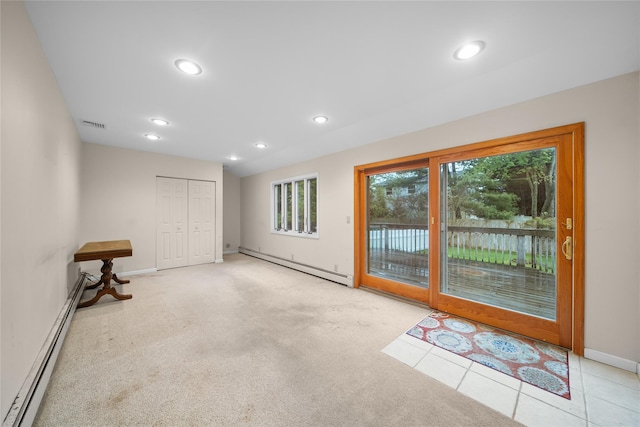 interior space featuring baseboards, a baseboard radiator, and recessed lighting