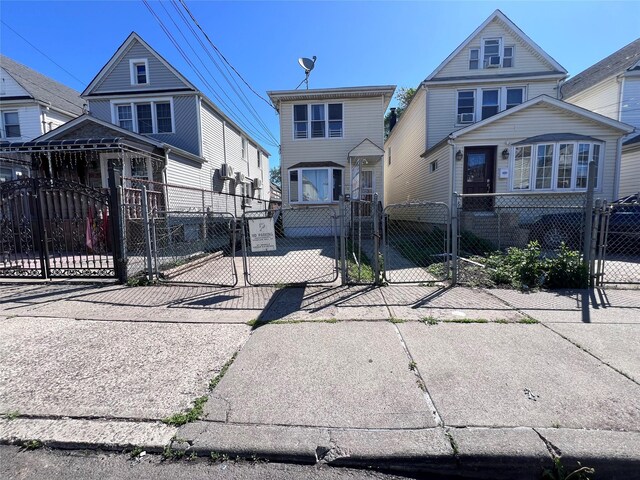 109-41 132nd St, South Ozone Park, NY 11420 - view of front of house with a gate and a fenced front yard