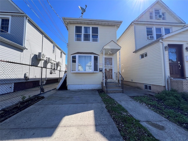 109-41 132nd St, South Ozone Park, NY 11420 - traditional-style home featuring fence and entry steps