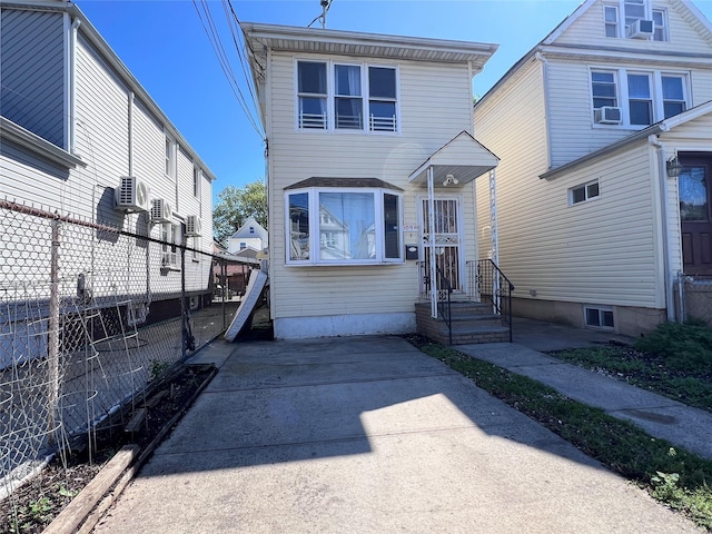 109-41 132nd St, South Ozone Park, NY 11420 - traditional-style house with fence and cooling unit