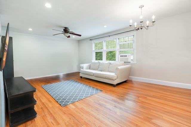 70 Underhill Ave Unit 1A, West Harrison, NY 10604 - living area with a chandelier, ceiling fan, cooling unit, wood finished floors, and baseboards