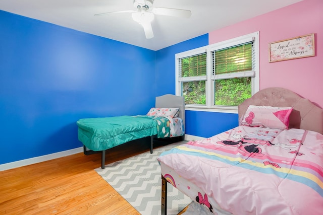 70 Underhill Ave Unit 1A, West Harrison, NY 10604 - bedroom with wood finished floors, ceiling fan, and baseboards