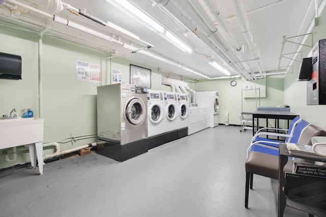 70 Underhill Ave Unit 1A, West Harrison, NY 10604 - communal laundry room with washing machine and clothes dryer