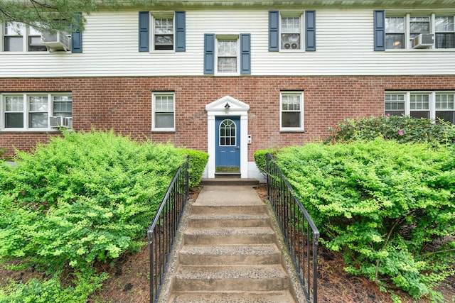 70 Underhill Ave Unit 1A, West Harrison, NY 10604 - view of front facade featuring brick siding and cooling unit