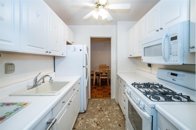 1841 Central Park Ave Unit 8E, Yonkers, NY 10710 - kitchen featuring white appliances, a sink, ceiling fan, white cabinets, and light countertops