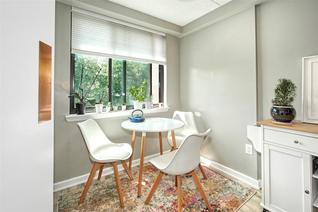 680 W Boston Post Rd Unit 3R, Mamaroneck, NY 10543 - dining space featuring baseboards and light wood-style flooring