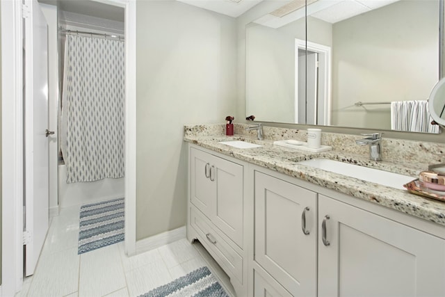 680 W Boston Post Rd Unit 3R, Mamaroneck, NY 10543 - bathroom with double vanity, shower / tub combo, baseboards, and tile patterned flooring