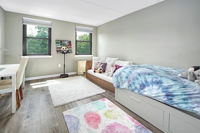 680 W Boston Post Rd Unit 3R, Mamaroneck, NY 10543 - bedroom with wood finished floors and baseboards