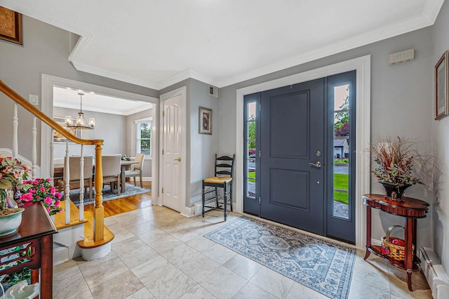 7 Jacqueline Ct, Port Jefferson Station, NY 11776 - foyer featuring ornamental molding, a chandelier, a baseboard heating unit, marble look tiles, and stairs
