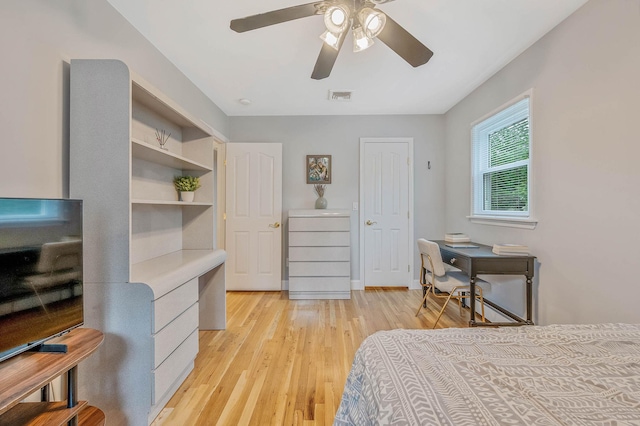 7 Jacqueline Ct, Port Jefferson Station, NY 11776 - bedroom with light wood-style floors, a desk, and a ceiling fan