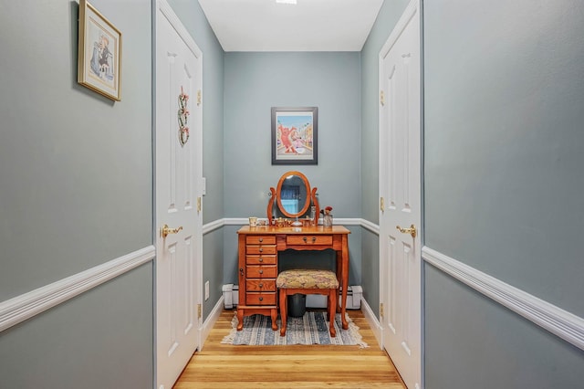 7 Jacqueline Ct, Port Jefferson Station, NY 11776 - corridor featuring wood finished floors and baseboards