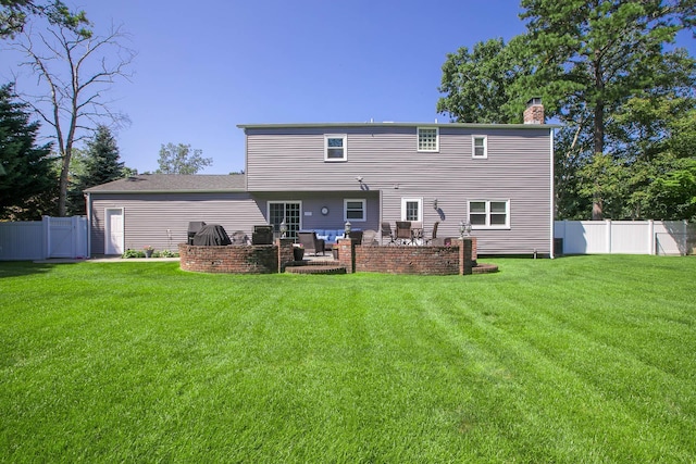 7 Jacqueline Ct, Port Jefferson Station, NY 11776 - rear view of house with a chimney and a patio area