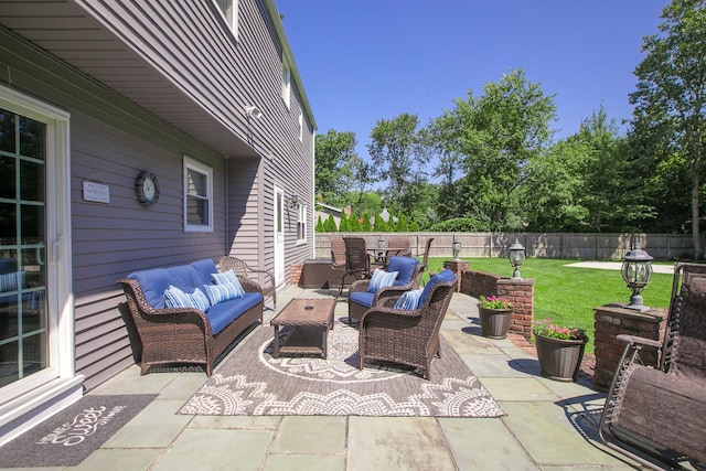 7 Jacqueline Ct, Port Jefferson Station, NY 11776 - fenced backyard with an outdoor hangout area and a patio
