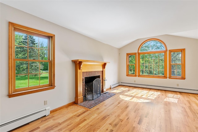 521 Plattekill Ardonia Rd, Wallkill, NY 12589 - unfurnished living room with baseboard heating, healthy amount of natural light, wood finished floors, and lofted ceiling