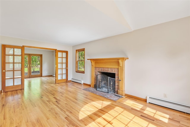 521 Plattekill Ardonia Rd, Wallkill, NY 12589 - unfurnished living room featuring french doors, a baseboard heating unit, a baseboard radiator, and plenty of natural light