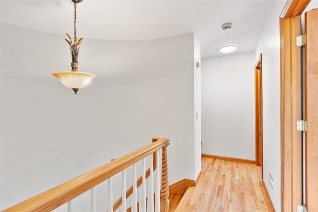 521 Plattekill Ardonia Rd, Wallkill, NY 12589 - hallway with light wood-style floors, an upstairs landing, and baseboards