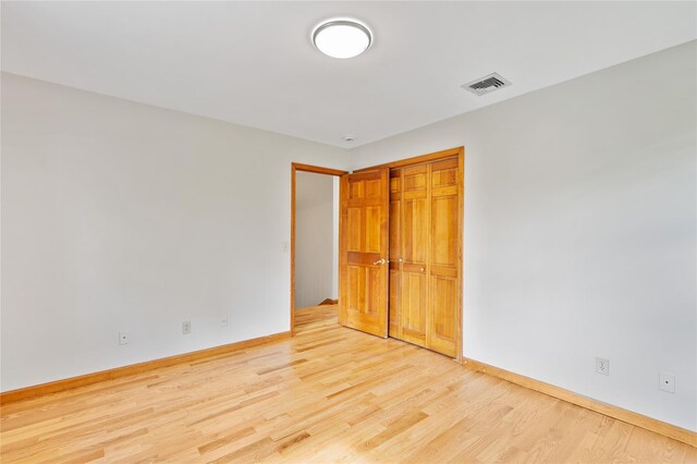 521 Plattekill Ardonia Rd, Wallkill, NY 12589 - unfurnished bedroom featuring light wood finished floors, baseboards, and a closet