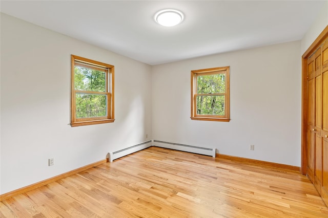 521 Plattekill Ardonia Rd, Wallkill, NY 12589 - unfurnished room featuring healthy amount of natural light, light wood-type flooring, baseboard heating, and baseboards