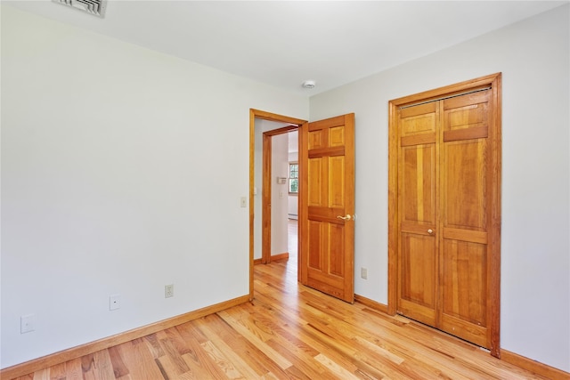 521 Plattekill Ardonia Rd, Wallkill, NY 12589 - unfurnished bedroom with light wood-style floors and baseboards