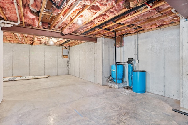 521 Plattekill Ardonia Rd, Wallkill, NY 12589 - unfinished below grade area with a water pressure tank, a water softener, and electric panel